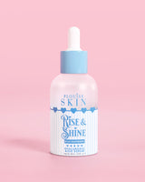 Blå och vit flaska PLouise Rise and Shine Hyaluronic Serum i blått hallon