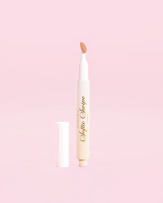 An image showing the P.Louise Softie Swipe Tinted Lip Mask in Barely There shade against a pink background