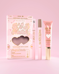 Det är A Match kosmetiska ögonbrynsset inklusive P.Louise Signature Blend Pen, Blade & Fade Brow Pencil och Brow Balm, förpackade i rosa och guld-tema lådor med hjärtmotiv.