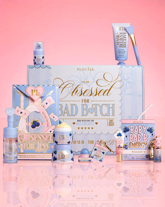 Products and packaging of the P.Louise Obsessed For Bad Bitch Bundle against a pink background 